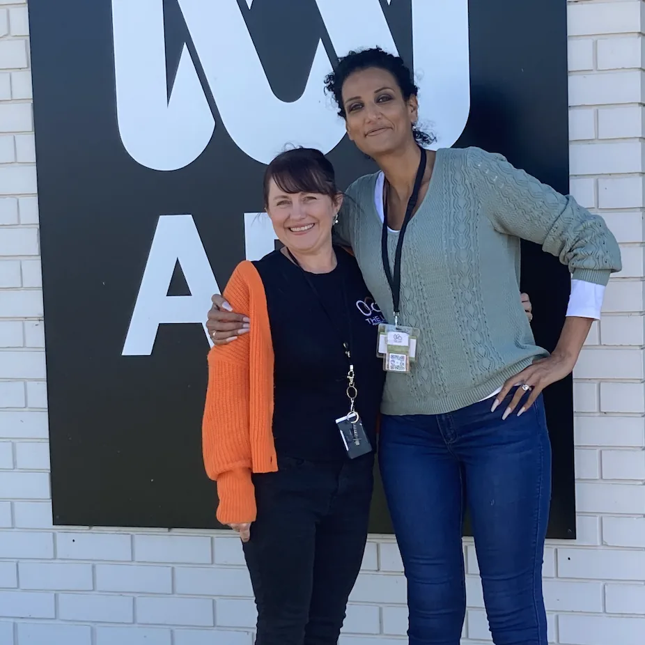 Two of the Link Foundation team outside an ABC building