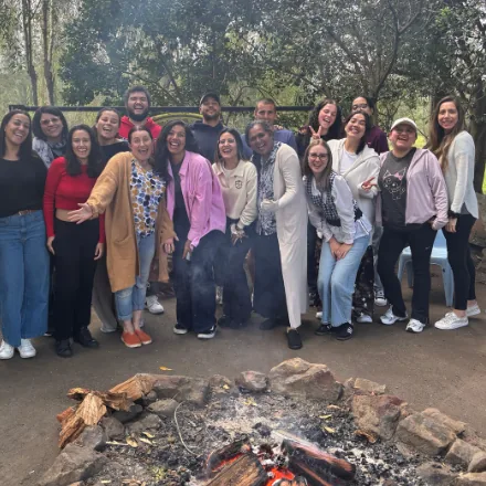 The Link Foundation team together around a fire pit